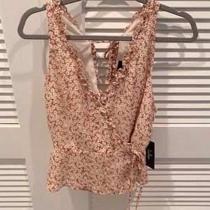 Lulu’s side tie wrap top